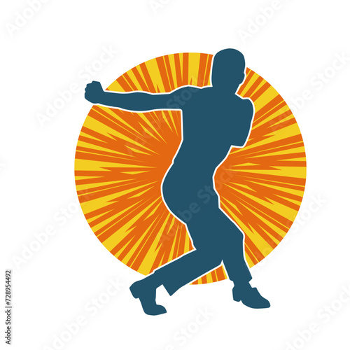 Silhouette of a man in oriental martial art pose. Silhouette of a male in martial art move.