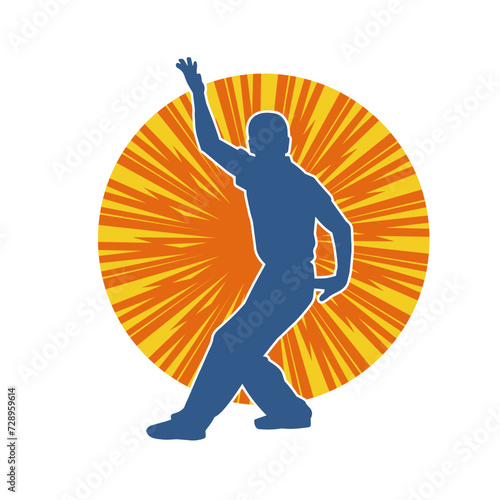 Silhouette of a man in oriental martial art pose. Silhouette of a male in martial art move.
