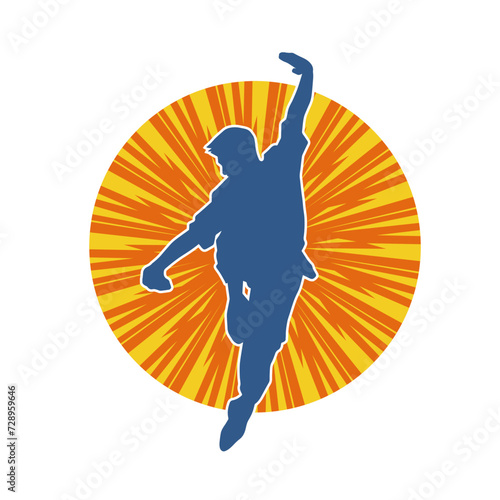 Silhouette of a man in oriental martial art pose. Silhouette of a male in martial art move.
