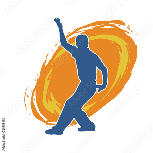 Silhouette of a man in oriental martial art pose. Silhouette of a male in martial art move.