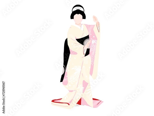 生成色の着物を着て踊る女性