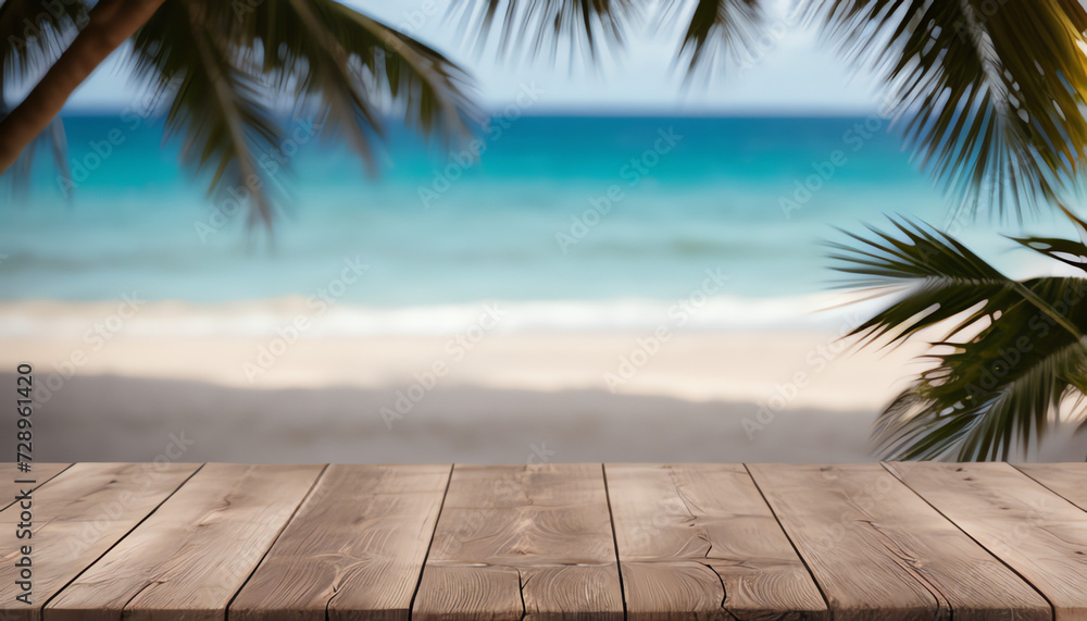 Fototapeta premium Empty wooden planks with blur beach on background, can be used for product placement, palm leaves on foreground