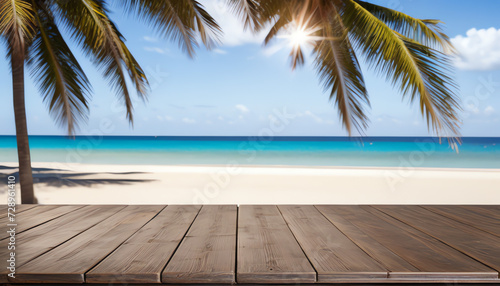 Empty wooden planks with blur beach on background  can be used for product placement  palm leaves on foreground