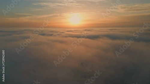 Wallpaper Mural Beautiful sunset cloudy sky aerial view. Golden sun shining over fluffy clouds Torontodigital.ca