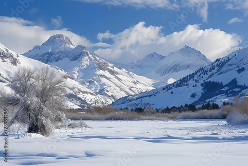 Winter landscape showcasing majestic mountains and serene snow-covered fields Creating a picturesque and tranquil scene