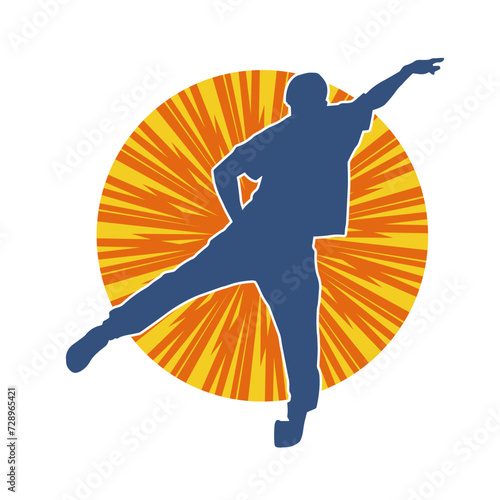 Silhouette of a male dancer in performing pose. Silhouette of a dancing man.