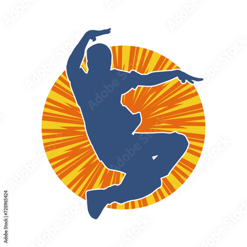 Silhouette of a male dancer in performing pose. Silhouette of a dancing man.