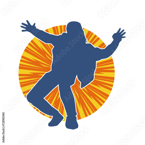 Silhouette of a male dancer in performing pose. Silhouette of a dancing man.