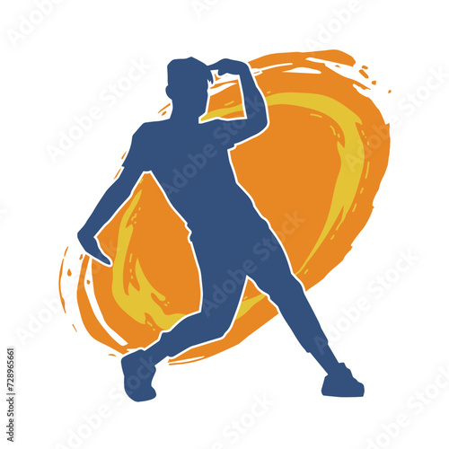 Silhouette of a male dancer in performing pose. Silhouette of a dancing man.