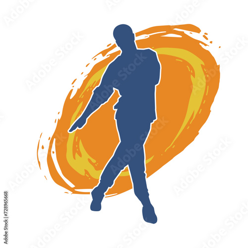 Silhouette of a male dancer in performing pose. Silhouette of a dancing man.