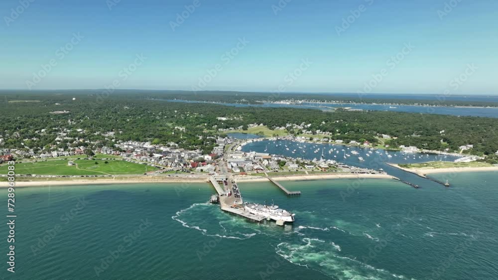 Drone shot of the ferry docking at Martha's Vineyard on the East Coast. Drone shot of the ferry docking at Martha's Vineyard on the East Coast.