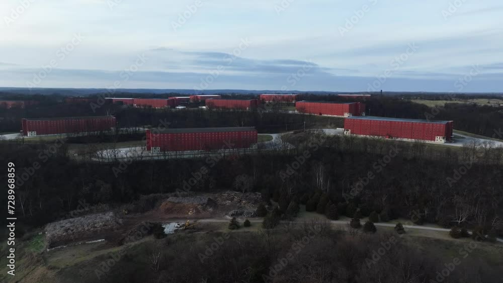 large red bourbon barrel rick houses in Frankfort Kentucky AERIAL TRUCKING PAN
