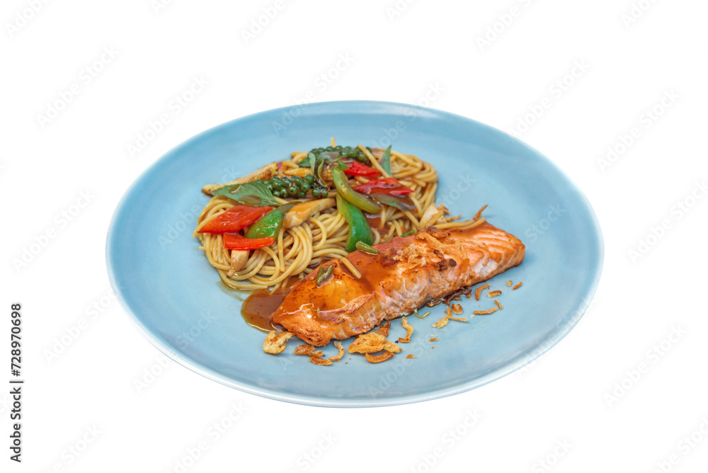 Delicious grilled salmon fillet steak serve with spagetti.Thai food fusion style Delicious grilled salmon fillet steak serve with spagetti.Thai food fusion style