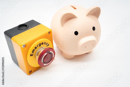 Concept of emergency savings fund. A piggy bank and stop button. money saving for emergency money.