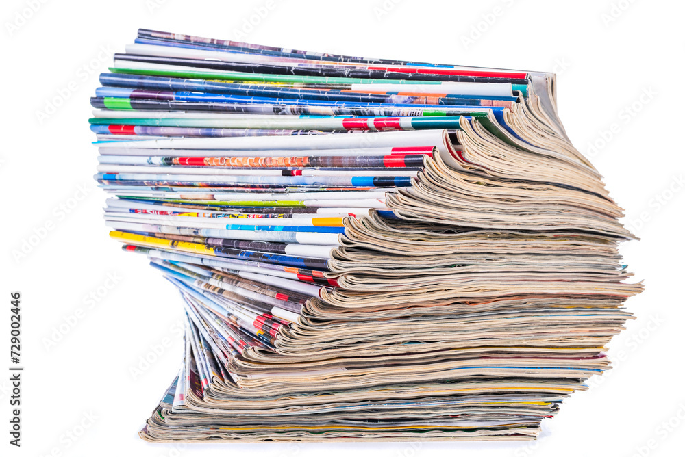 Pile of old paper colored magazines isolated on white background Pile of old paper colored magazines isolated on white background