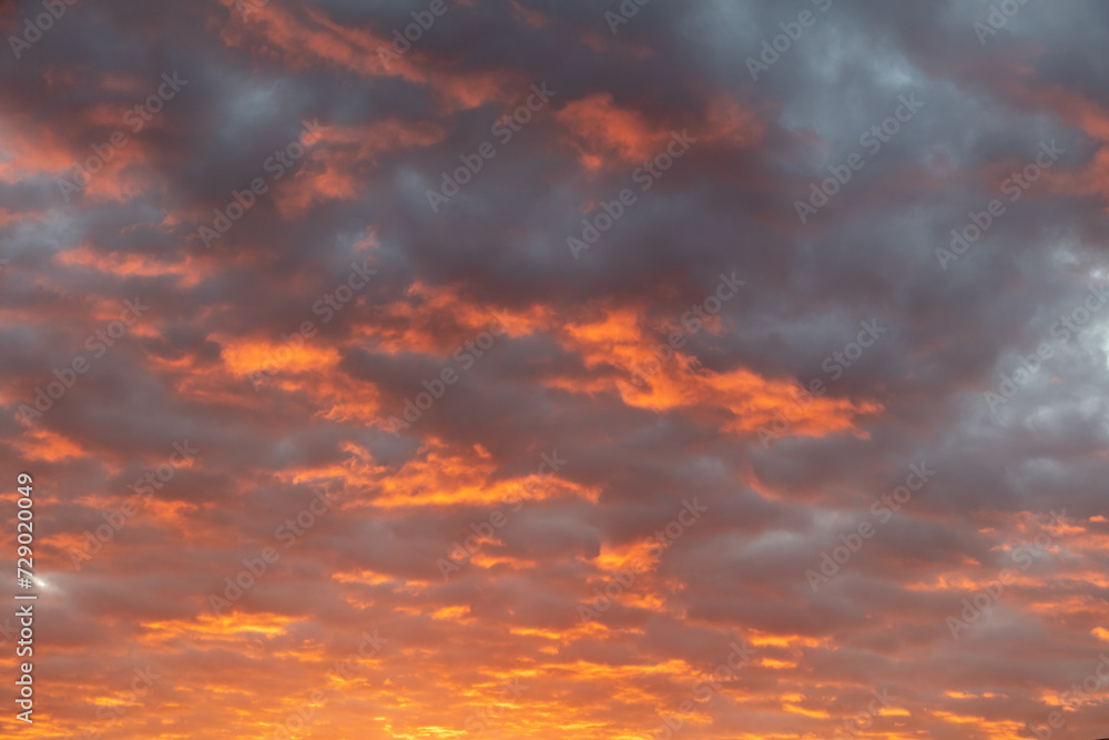 Colorful clouds at sunrise. Background