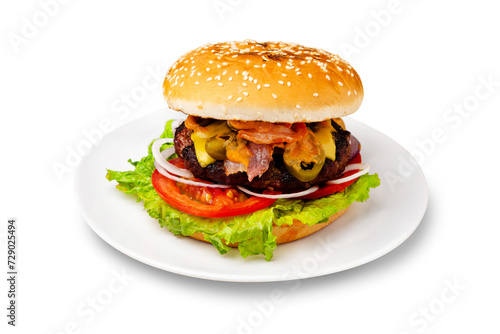 Burger  hamburger with meat cutlet  bacon  jalapeno  tomato and lettuce on a plate. Isolated.