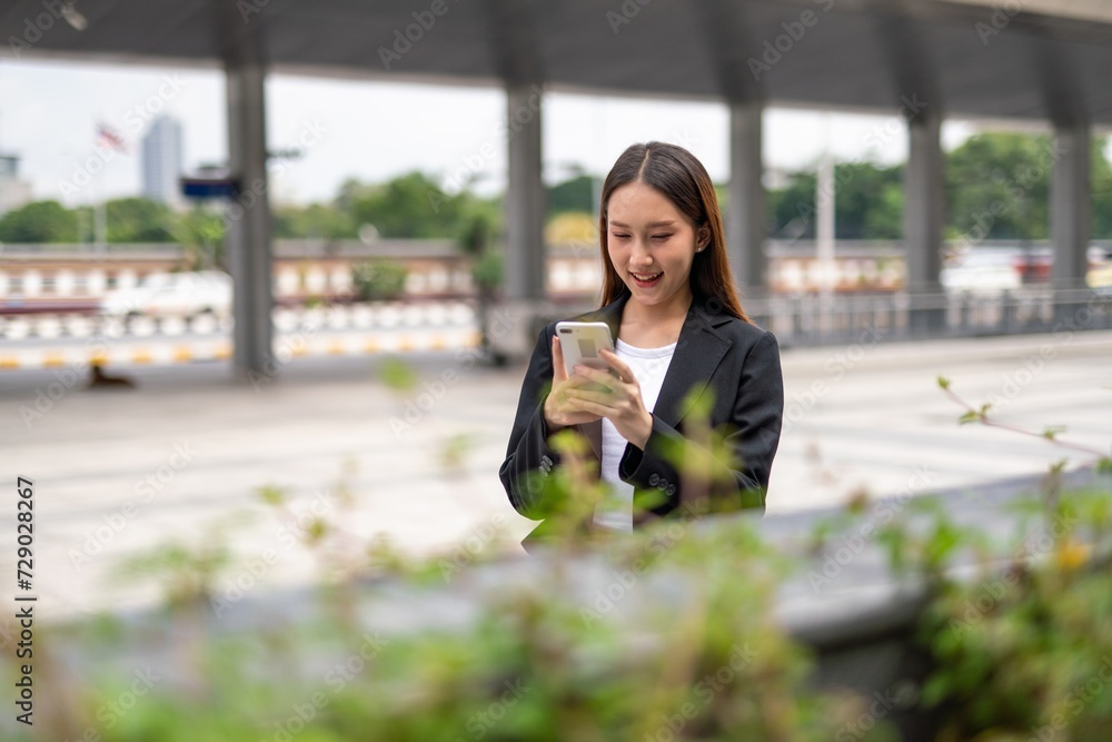 Young woman using phone outdoor Young woman using phone outdoor