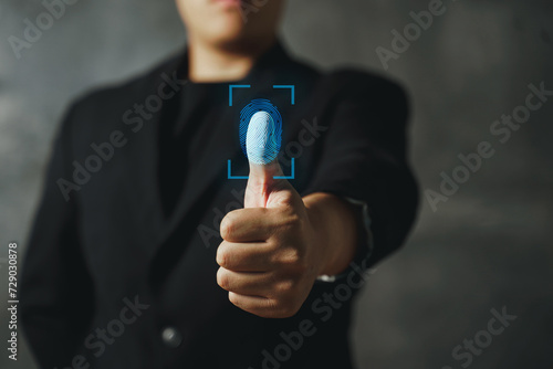 Touch screen, fingerprint scanner, biometric identity of a man hand in a blurred background .