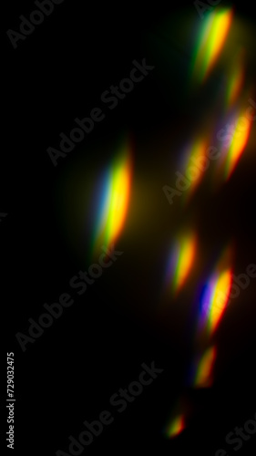 Iridescent highlights on a black background. to overlay and create a bright, sunny and interesting picture