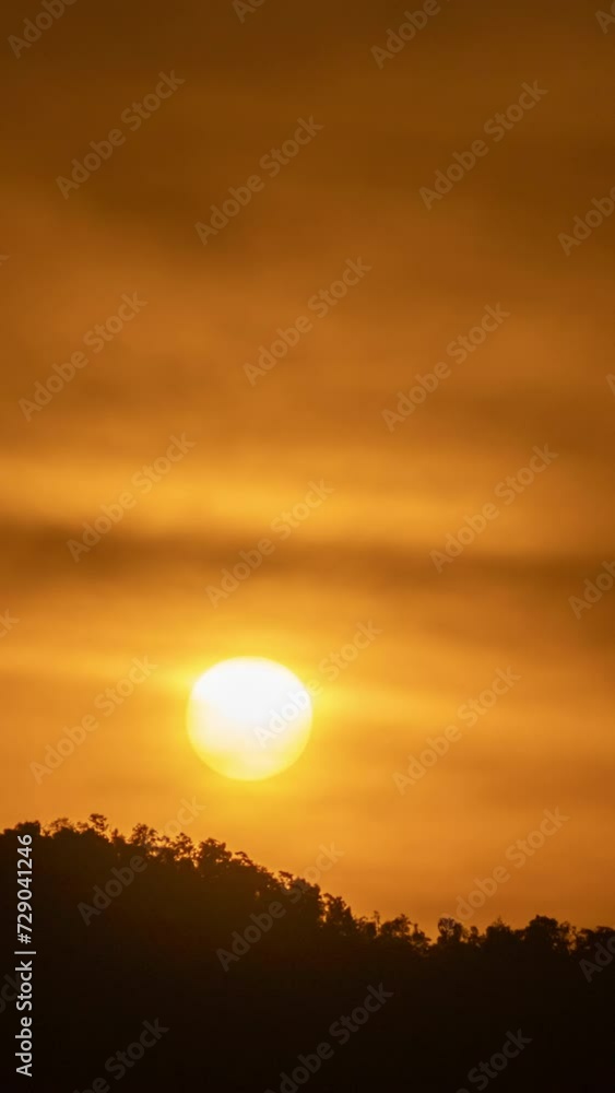 Timelapse of dramatic sunrise with orange sky in a sunny day. Timelapse of dramatic sunrise with orange sky in a sunny day.