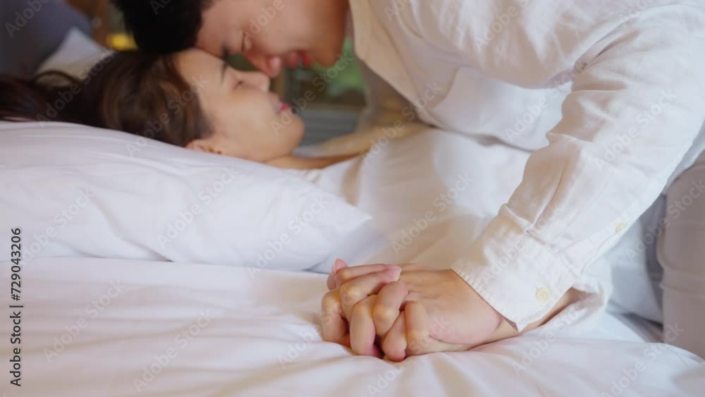 Asia people young adult man woman lover on bed in health care safe sex flirt relax hug passion kiss. I love you falling in love trust tender sexual pose happy comfort sweet asian lovers just married. Asia people young adult man woman lover on bed in health care safe sex flirt relax hug passion kiss. I love you falling in love trust tender sexual pose happy comfort sweet asian lovers just married.