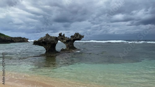 Heart Rock is located at Tinu Hama Beach on the Kouri Island photo