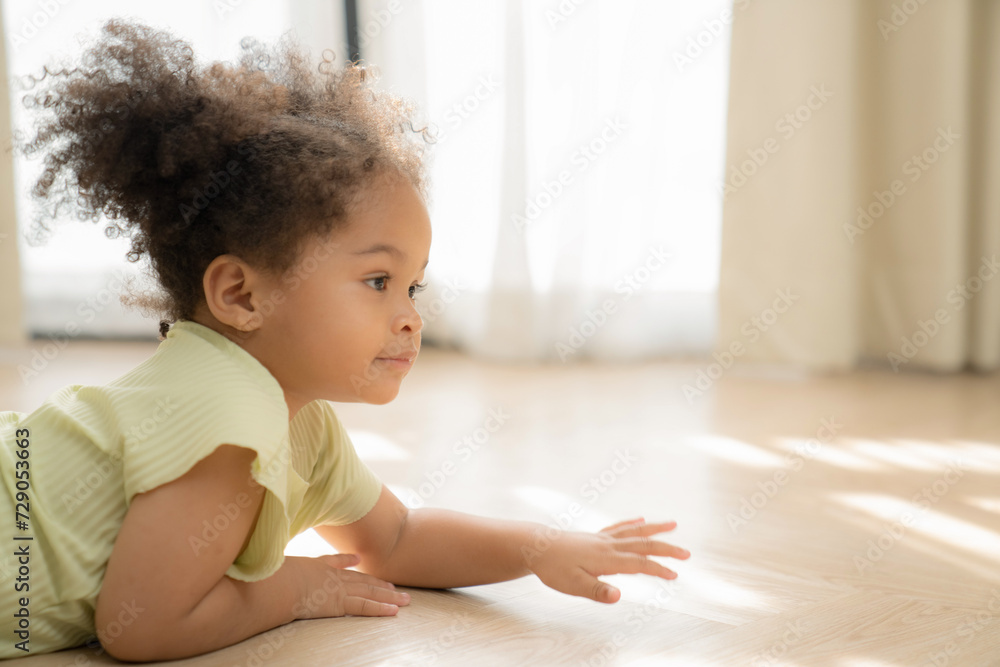 Little African American girl playing freedom at home. the child playing high-quality photo Little African American girl playing freedom at home. the child playing high-quality photo