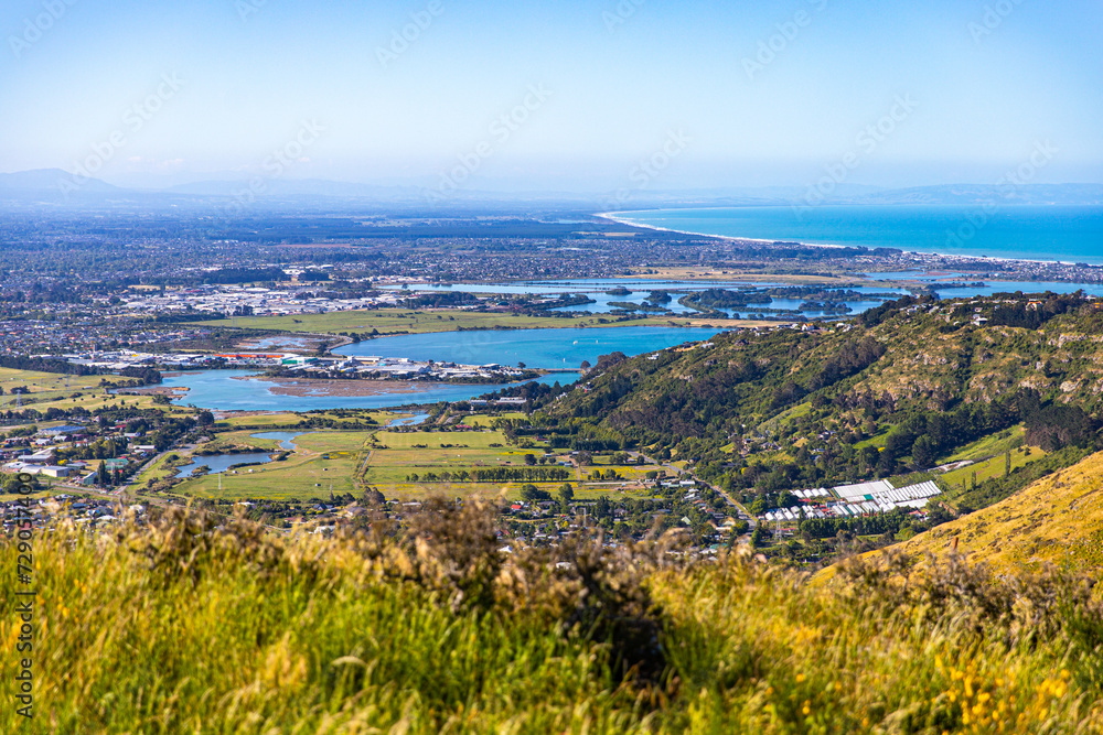 Obraz premium panorama of christchurch city as seen from the gondola summit, bridle path with scenic view of the city, canterbury, new zealand south island