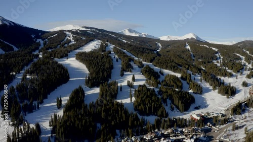 Aerial Drone Copper Mountain Colorado Ikon Epic Pass winter spring sunny first light sunrise morning sunset half pipe chairlift ski runs east village Vail Pass cinematic slowly circle right motion photo