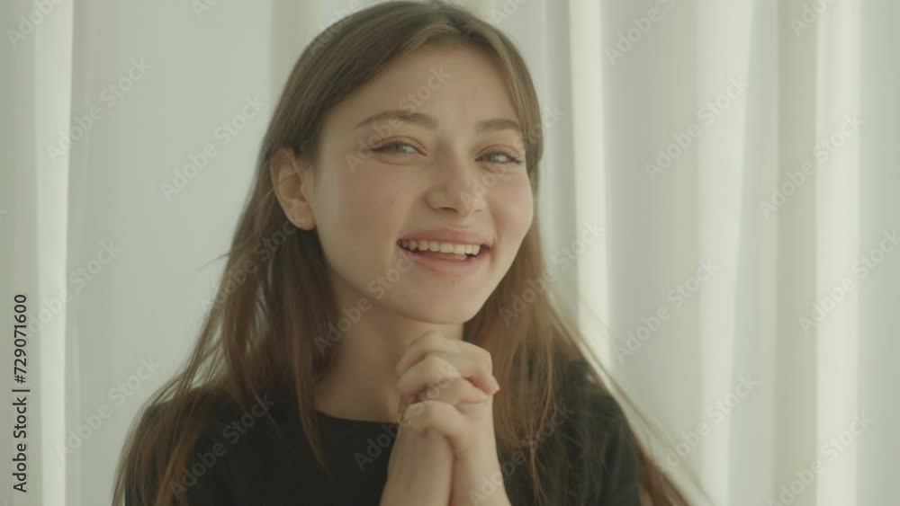 A young woman, super happy and smiling A young woman, super happy and smiling