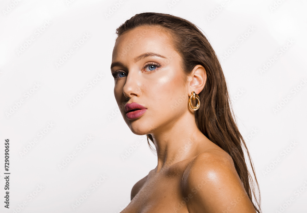 Natural beauty portrait woman in studio. Close-up face portrait of young female model. Natural image without retouching, shallow depth of field.