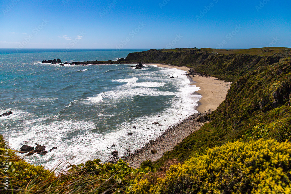 unique landscape of cape foulwind on the west coast of new zealand south island; scenic little bays with large cliffs and rocky islands; cape foulwind walkaway near westport unique landscape of cape foulwind on the west coast of new zealand south island; scenic little bays with large cliffs and rocky islands; cape foulwind walkaway near westport