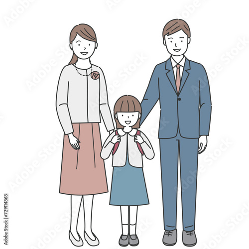 入学式に行く両親と女の子