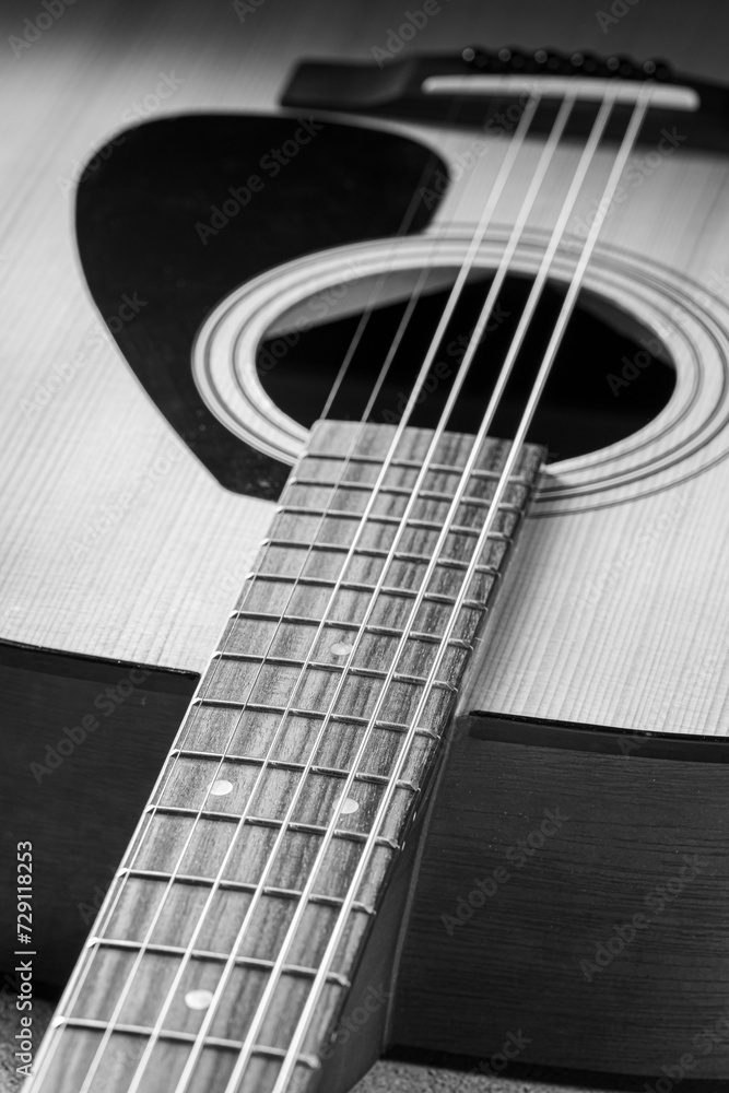 Classical guitar close up. Acoustic guitar on wood background.Music instrument concept Classical guitar close up. Acoustic guitar on wood background.Music instrument concept
