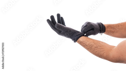 Male hands in winter textile gloves on a white isolated background