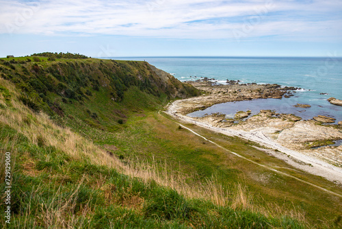 panorama of kaikoura peninsula in north canterbury, new zealand; famous rocky peninsula with cliffs and fur seal colony