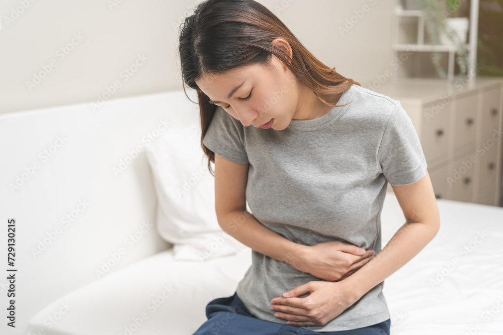 Flatulence ulcer, asian young woman, girl hands in belly, stomach pain from food poisoning, abdominal pain and digestive problem, gastritis or diarrhea. Abdomen inflammation, menstrual period people. Flatulence ulcer, asian young woman, girl hands in belly, stomach pain from food poisoning, abdominal pain and digestive problem, gastritis or diarrhea. Abdomen inflammation, menstrual period people.