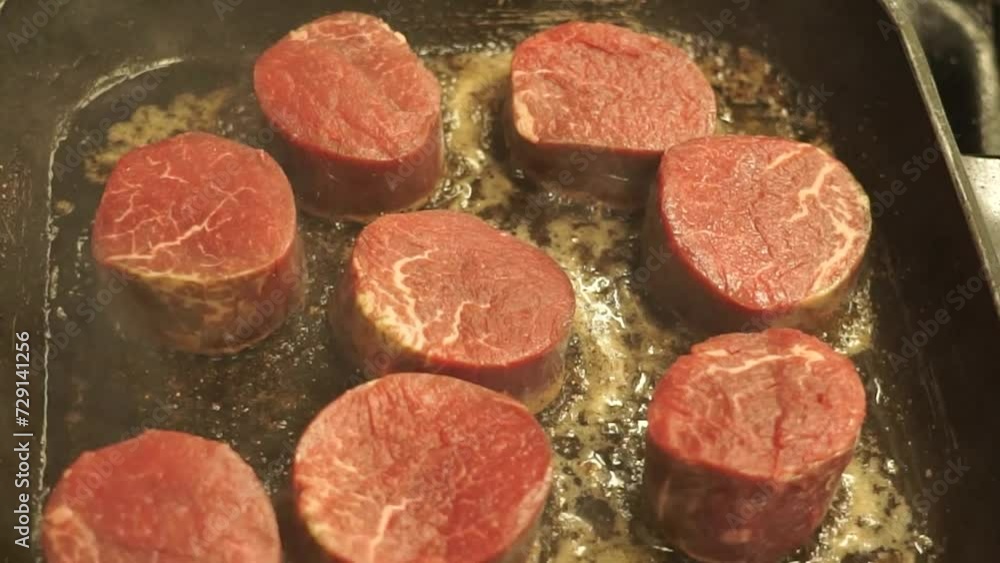Cooking Filet Mignon Steak On Grill Pan. - close up shot Cooking Filet Mignon Steak On Grill Pan. - close up shot