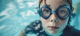 Close up of boy child swimmer in swimming pool with copy space for text placement