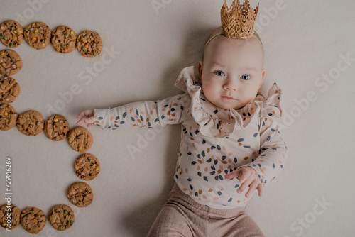 5 months baby girl , little princess, baby in body and leggins, baby with a crown