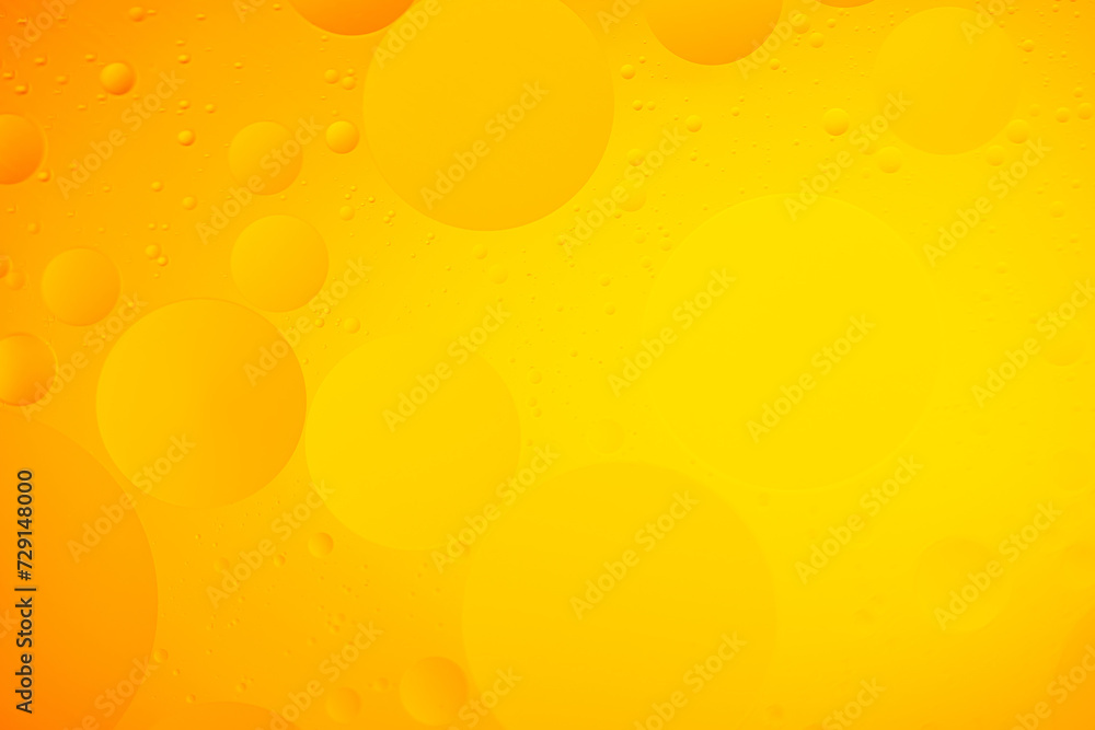 Oil Drops On A Light Yellow Background