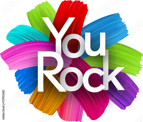 You rock paper word sign with colorful spectrum paint brush strokes over white.