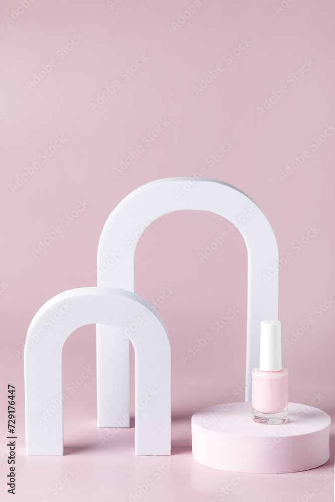 Composition from Pink nail polish bottle on the podium Pink Bright background Festive Cosmetic Concept Minimal Vertical Composition from Pink nail polish bottle on the podium Pink Bright background Festive Cosmetic Concept Minimal Vertical