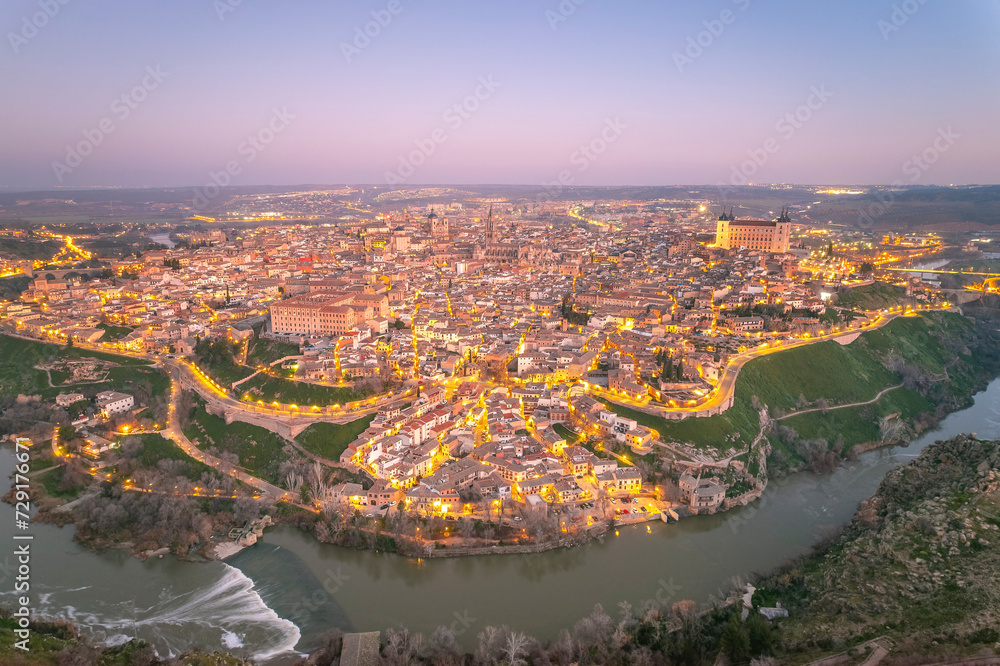 Fototapeta premium Aerial photographs during sunrise of the city of Toledo, alcazar and cathedral, drone
