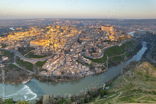 Aerial photographs during sunrise of the city of Toledo, alcazar and cathedral, drone