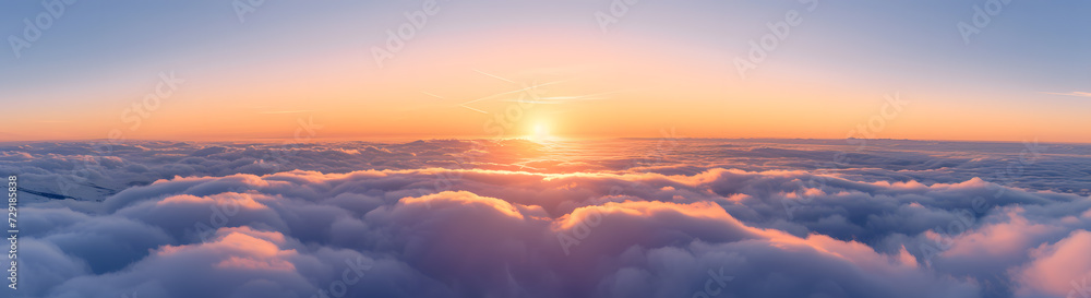 sunrise time above the clouds