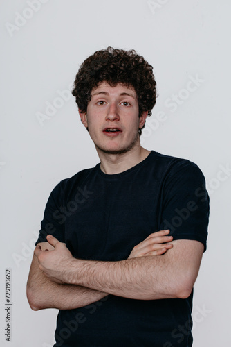 Wallpaper Mural Portrait of young amazed man isolated on white background Torontodigital.ca