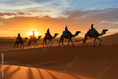 tourists on camels crossing desert dunes at sunrise