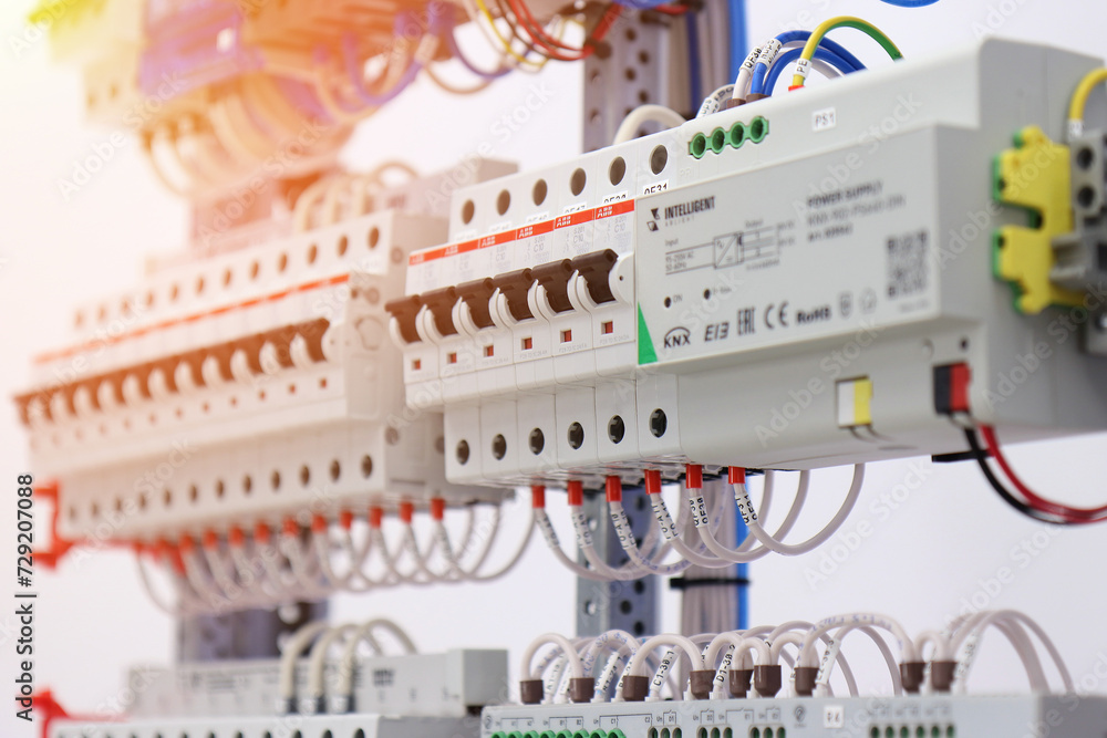 Electronic control modules for apartment automation are installed in an ...